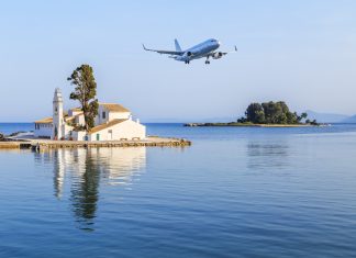 Corfu Airport Now 5th Busiest in Greece Passenger plane approaches Corfu airport during summer in Grecce Island of Corfu (Kerkyra) CFU