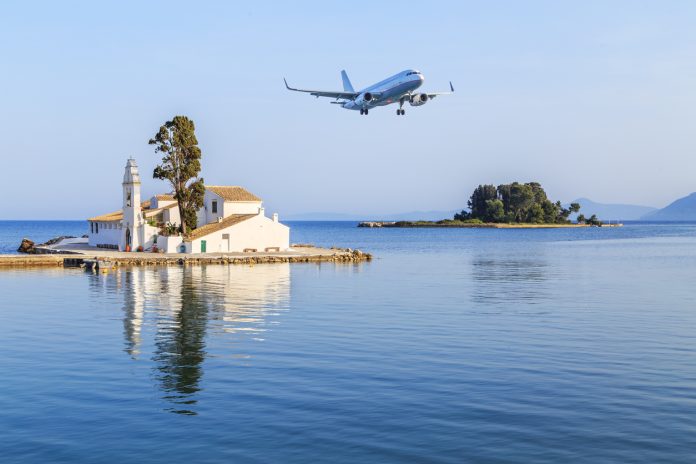 Corfu Airport Now 5th Busiest in Greece Passenger plane approaches Corfu airport during summer in Grecce Island of Corfu (Kerkyra) CFU