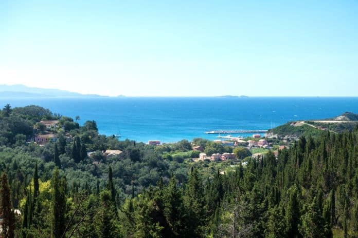 Stunning view down to the sea and the surrounding area from top of the mountain in Ereikoussa island, Greece